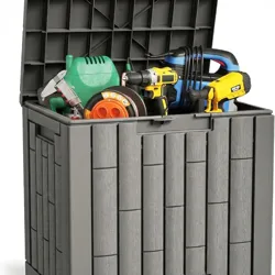 A gray deck box with a black lid is open, displaying various stored items such as a garden hose, buckets, and cleaning supplies.