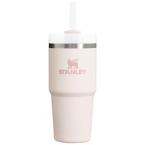 A white Stanley insulated tumbler with a straw and logo, featuring a stainless steel rim.
