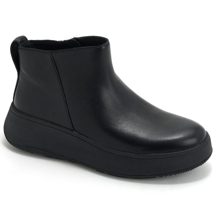 Black ankle boot with a streamlined, minimalist design and a thick, flat sole.