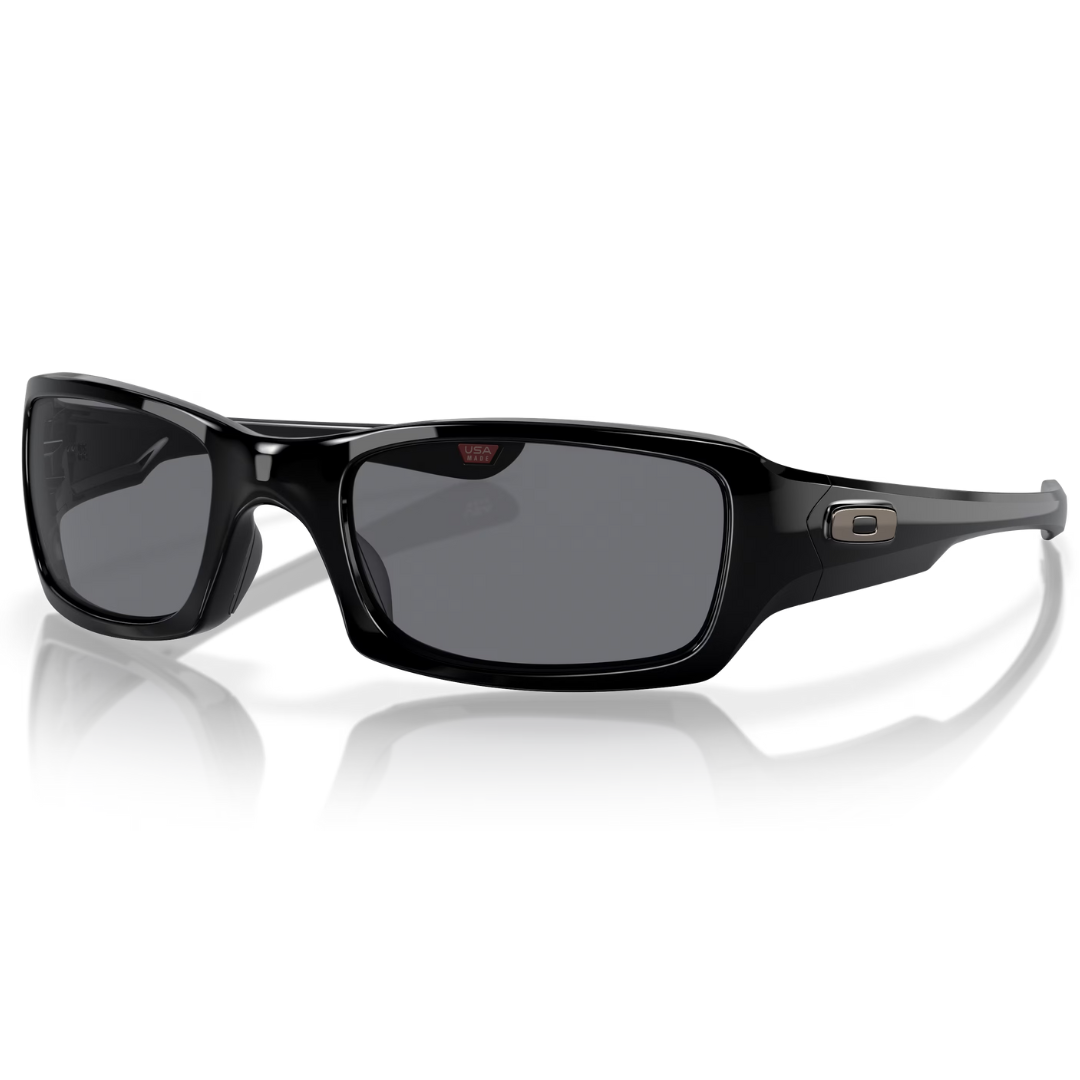 These are black Oakley sunglasses with rectangular frames and dark lenses, featuring a silver Oakley logo on the temples.