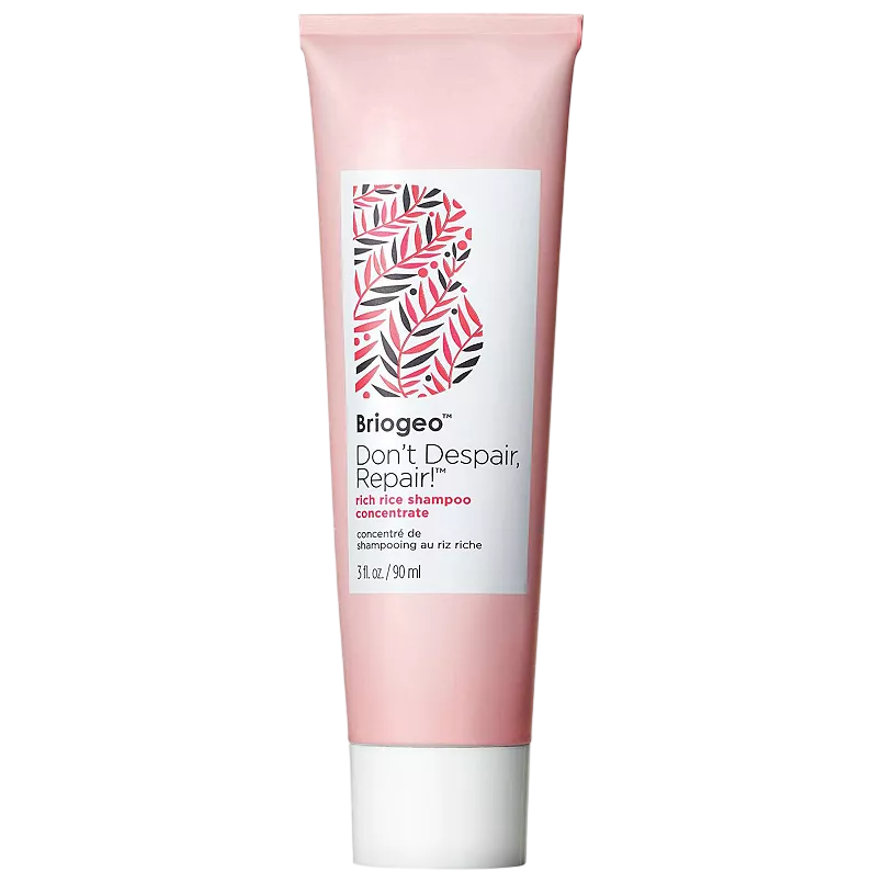 Briogeo Don't Despair, Repair! rich rice shampoo concentrate, 3 fl. oz. (90 ml), in a pink tube featuring a decorative leaf pattern.