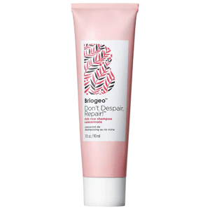 Briogeo Don't Despair, Repair! rich rice shampoo concentrate, 3 fl. oz. (90 ml), in a pink tube featuring a decorative leaf pattern.