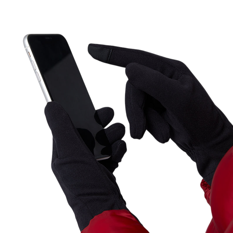A person wearing black touchscreen gloves is using a smartphone while wearing a red jacket.