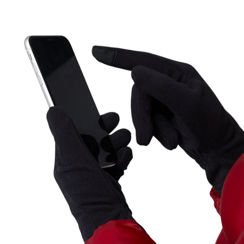 A person wearing black touchscreen gloves is using a smartphone while wearing a red jacket.