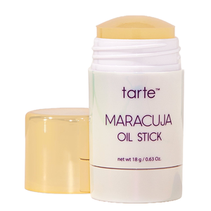 Tarte Maracuja Oil Stick is a skincare product in a solid stick form, offering easy application of maracuja oil. It's packaged in a cylinder with a golden cap and contains 18g (0.63 oz).
