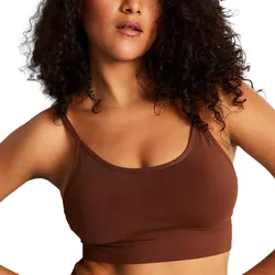 A person is wearing a brown spaghetti strap bralette, featuring a scoop neckline and a fitted, comfortable design.