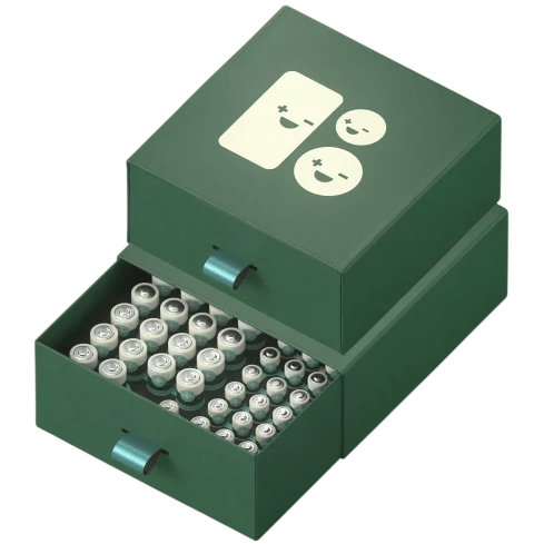 Green battery storage box with two drawers containing various sizes of batteries. The top shows positive and negative symbols in a playful design.
