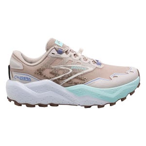 Brooks Women's Caldera 7 Shoes feature a beige upper with light blue and white accents, providing a rugged sole suitable for trail running. The design includes cushioning and support for long-distance runs.
