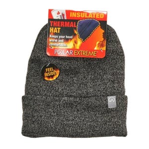 Sherpa Lined Cuffed Knit Hat, labeled as a Polar Extreme thermal hat, is designed to keep your head warm and comfortable with insulation. The packaging highlights its features, including a tag that says \“Feel Inside!\“