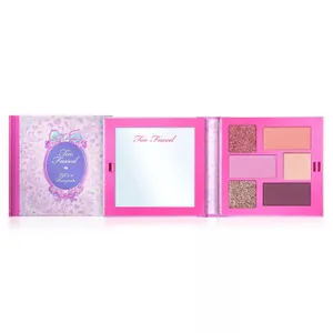 Too Faced \“Life's a Fairytale\“ eyeshadow palette featuring six shades in a pink case with an integrated mirror.