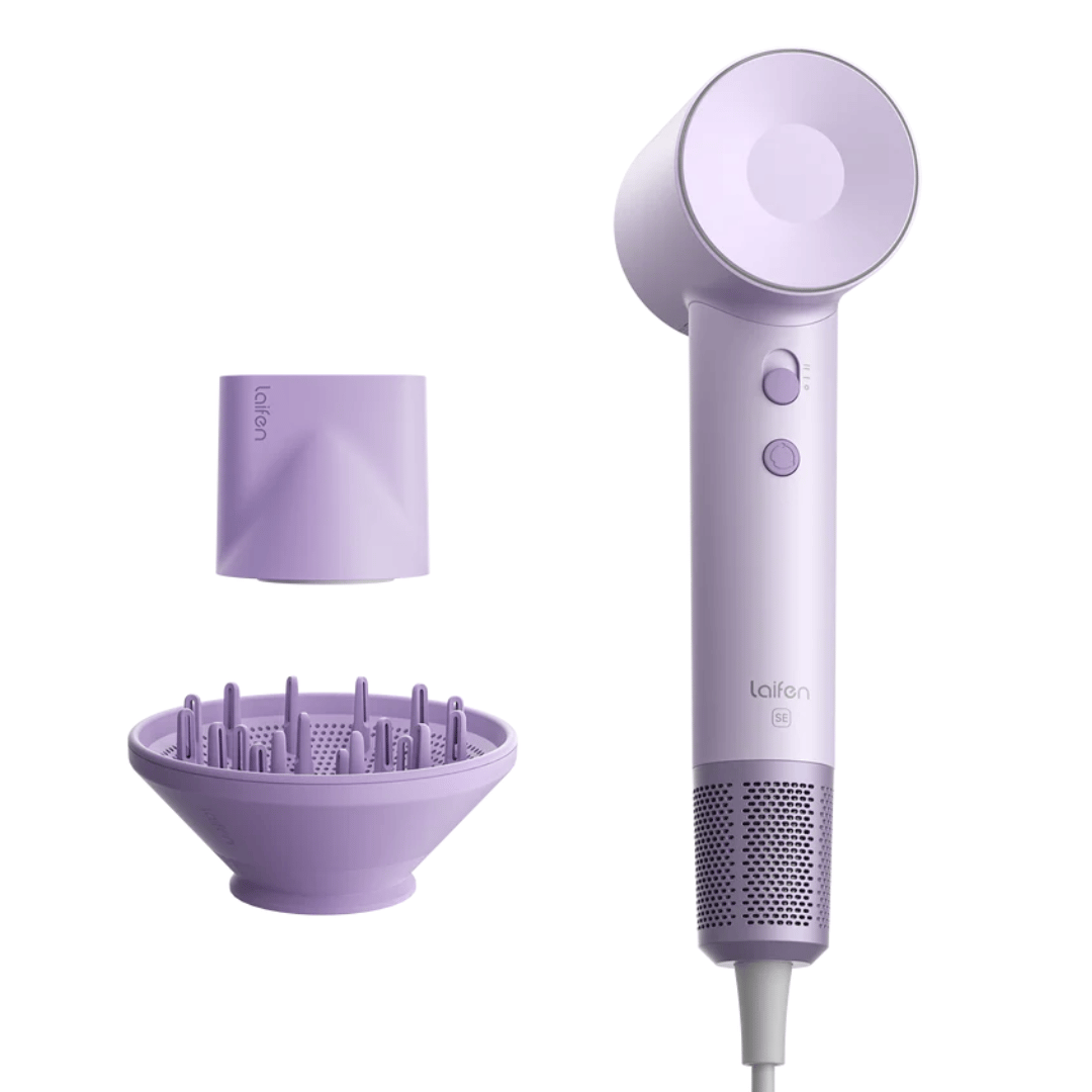 The Laifen SE High Speed Hair Dryer in lavender includes a nozzle and a diffuser attachment, featuring a sleek, modern design with a cylindrical body and simple button controls.