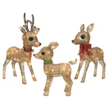 Three illuminated reindeer figures with golden bodies and sparkling lights; one with antlers, wearing a red collar, another with a green collar, and a third with a red bow.