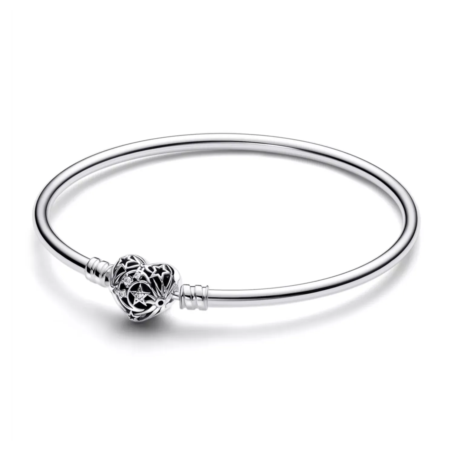 A silver bangle bracelet featuring a heart-shaped charm with star and moon cutouts.