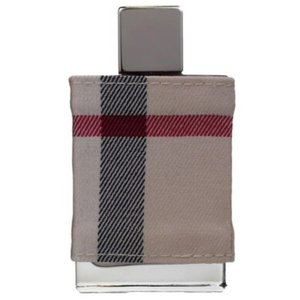 A perfume bottle with a plaid fabric cover featuring red and black stripes.