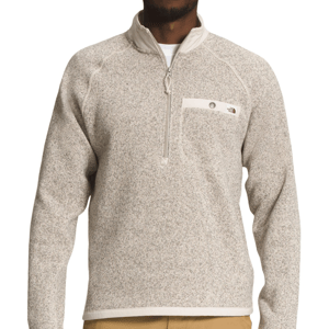 The North Face Gordon Lyons Jacket is a beige, speckled fleece pullover with a quarter-zip collar and a small zippered chest pocket, offering a casual yet functional design for cool weather.
