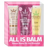 Hempz set includes Glow Getter Lip Gloss, Pink Peppermint Meringue Lip Balm, and Lips Ultra Moisturizing Lip Balm, all enriched with hemp seed oil.
