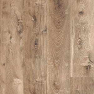 Beige-brown luxury vinyl plank flooring with realistic wood grain patterns and natural knots, showcasing a rustic and warm appearance.