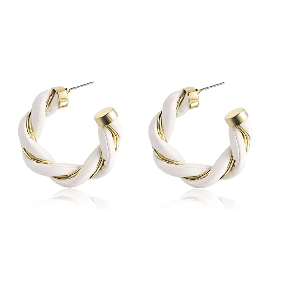 A pair of twisted hoop earrings featuring alternating bands of gold-tone and white enamel.