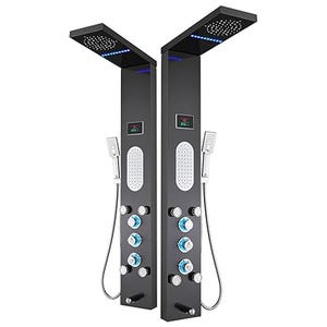 Dual-panel shower tower system with multiple body jets, hand-held showerheads, and overhead showers. Features digital temperature displays.