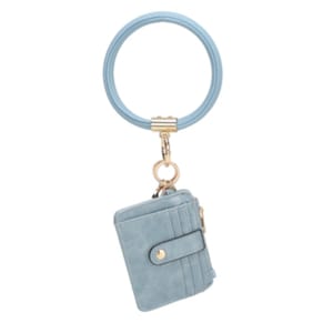 A light blue wristlet with a small wallet attached, featuring multiple card slots and a gold clasp.