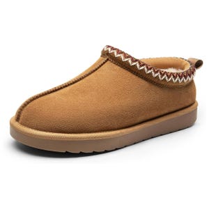 Brown suede slipper with a flat sole, featuring a decorative braided pattern around the opening and a pull tab at the back.