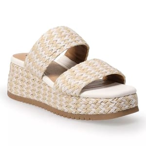Woven wedge sandal with two wide straps and a textured platform sole in a neutral beige and white colorway.