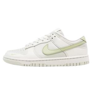 A white Nike Dunk Low sneaker with light green accents and a matching sole.