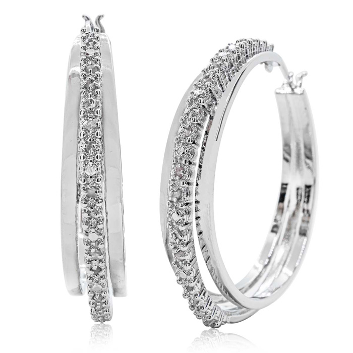 A pair of silver hoop earrings with an inner row of small crystals.