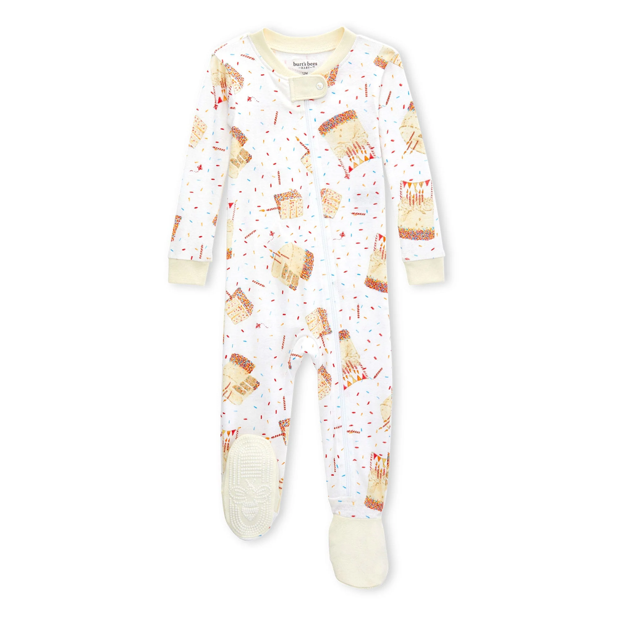 Baby onesie with a milk and cookie print, featuring long sleeves and footed design for warmth and comfort, with a front zip closure for easy dressing.