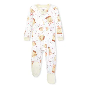 Baby onesie with a milk and cookie print, featuring long sleeves and footed design for warmth and comfort, with a front zip closure for easy dressing.