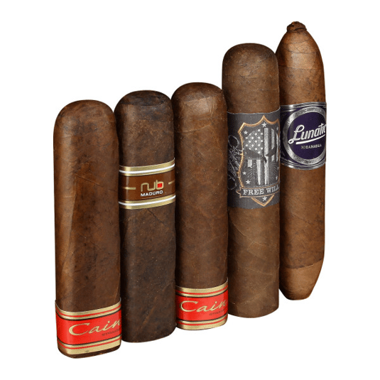 A selection of five cigars with various band designs, including labels reading \“Cain,\“ \“Nub Maduro,\“ \“Free Will,\“ and \“Lunatic Nicaragua.\“