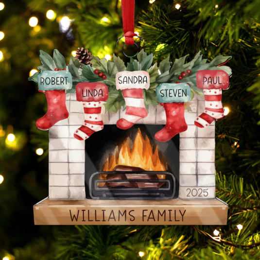 A personalized Christmas ornament features a fireplace with stockings named Robert, Linda, Sandra, Steven, and Paul, marked with \“Williams Family\“ and the year 2025.