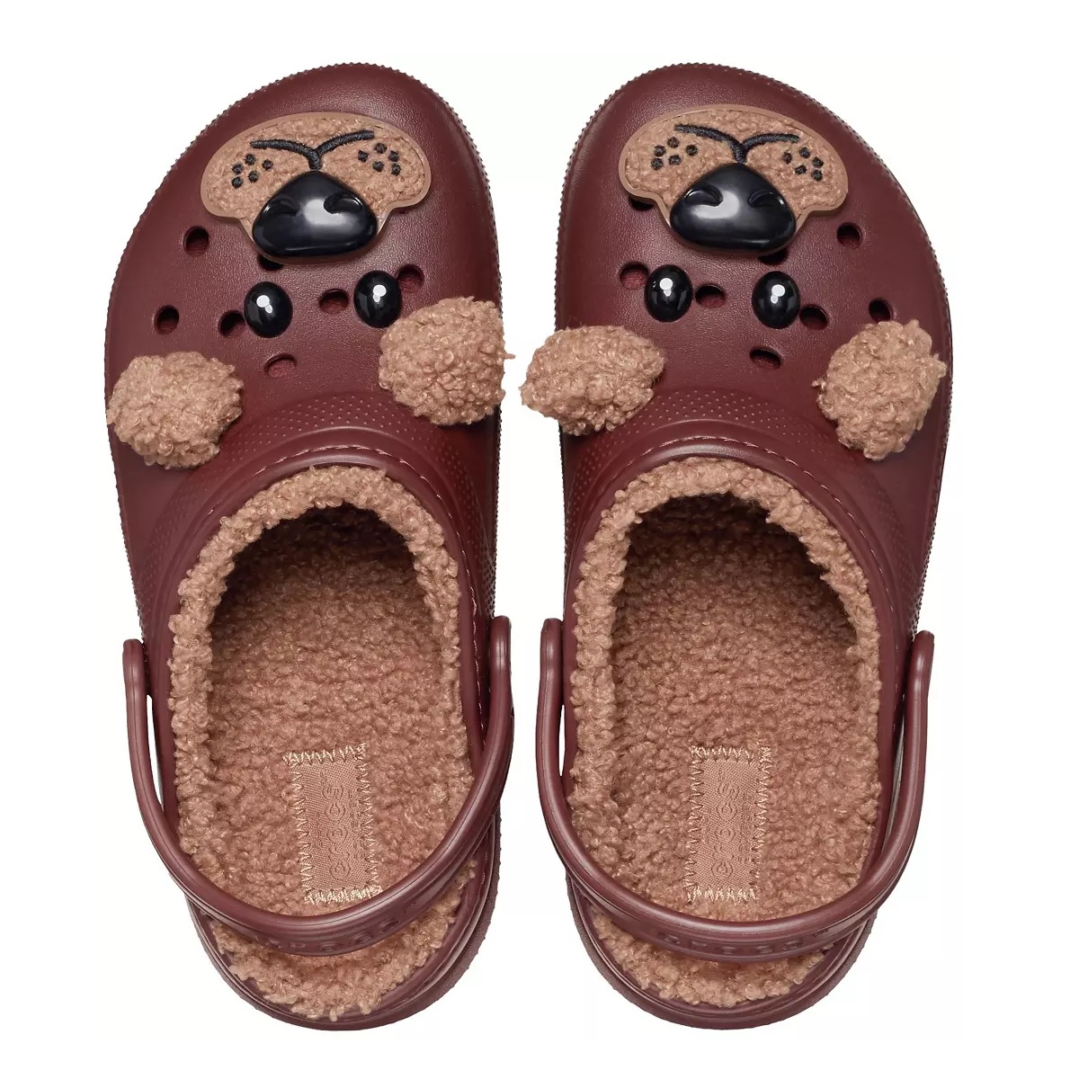 Brown clogs with a dog-themed design feature fluffy ears and a nose on the front, along with a soft, textured interior for comfort.