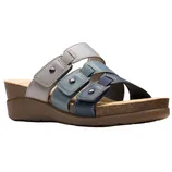 A wedge sandal featuring multicolored strap design with adjustable buckles on a cork sole.