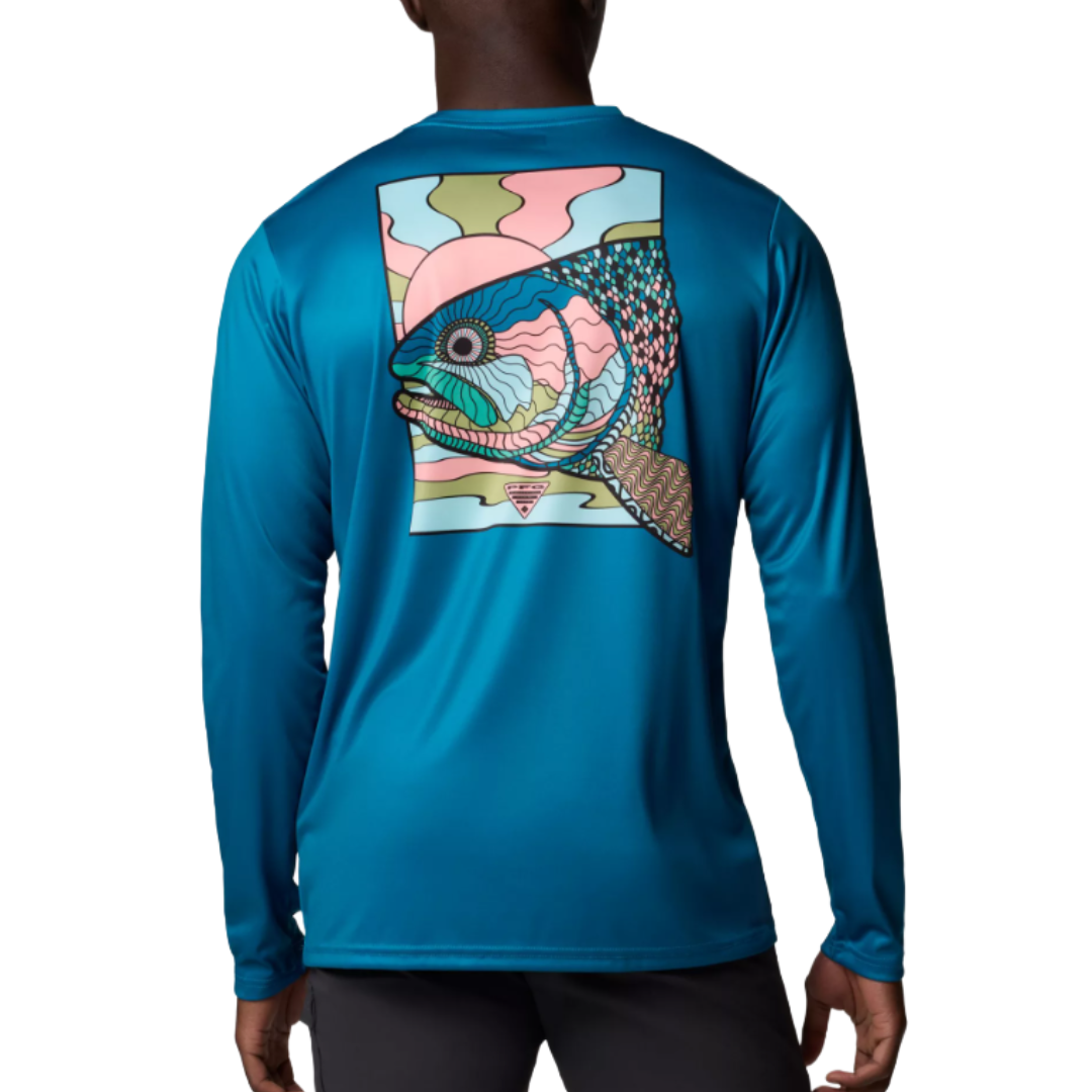 A long-sleeve, teal shirt featuring a colorful, abstract fish design on the back.