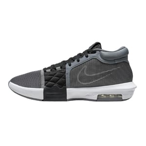 A black and gray Nike sneaker with a visible air cushion in the sole and a quilted section near the laces.