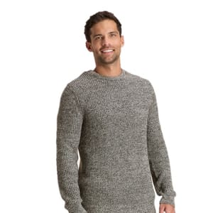 A man is wearing a gray, ribbed knit sweater.