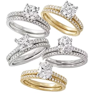 A collection of elegant engagement and wedding ring sets featuring various diamond cuts and settings in both gold and silver bands.