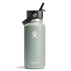 A Hydro Flask water bottle with a sage green finish, featuring a black straw lid and carrying handle.