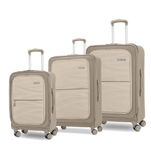 A set of three beige suitcases in different sizes with wheels and telescopic handles.