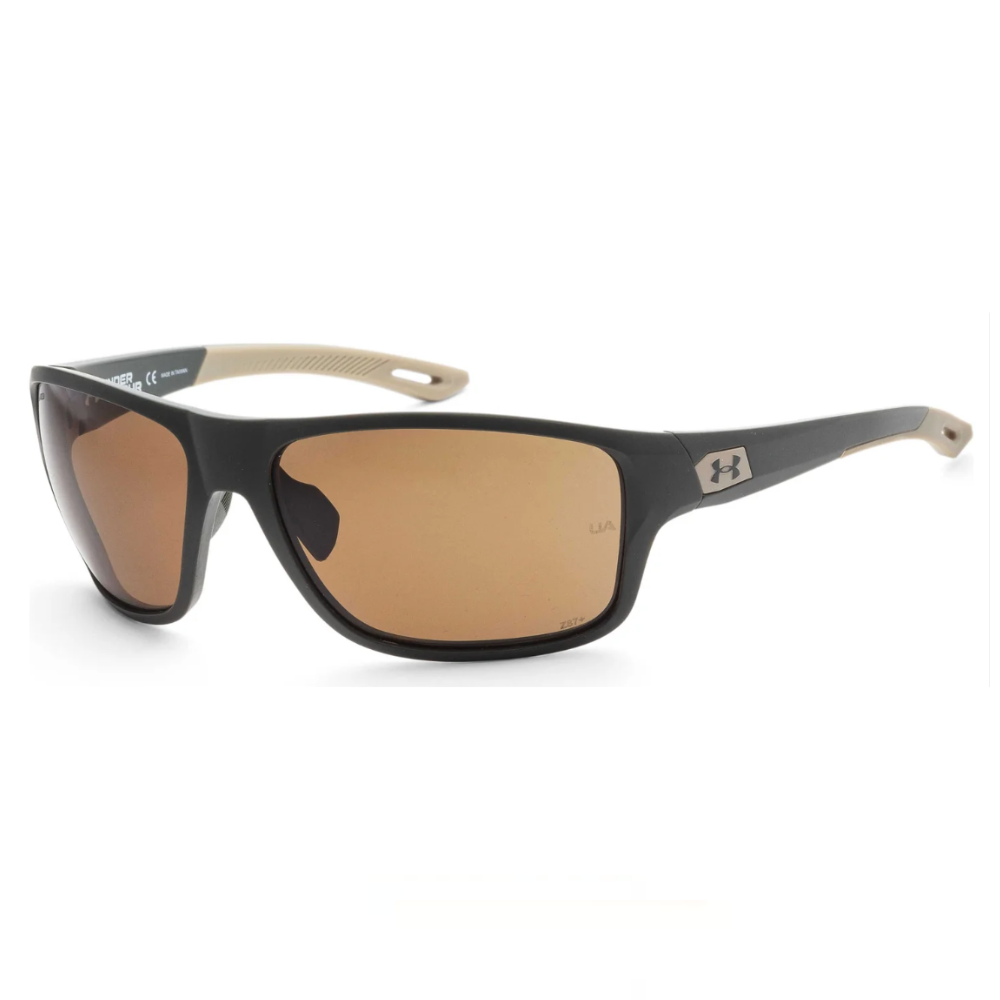 Sunglasses with a dark frame, beige temple tips, and brown lenses, featuring the Under Armour logo on the side.