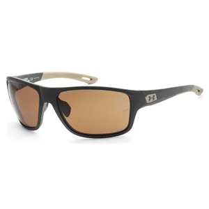 Sunglasses with a dark frame, beige temple tips, and brown lenses, featuring the Under Armour logo on the side.