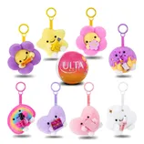 A set of eight plush keychains featuring cheerful characters with beauty product accessories, surrounding an Ulta Beauty sphere. Each plush is uniquely colored and themed, including stars, flowers, a rainbow, hearts, and a cloud.