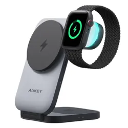 A wireless charging station designed for simultaneously charging a smartwatch and a smartphone, featuring a sleek design and the AUKEY brand logo.