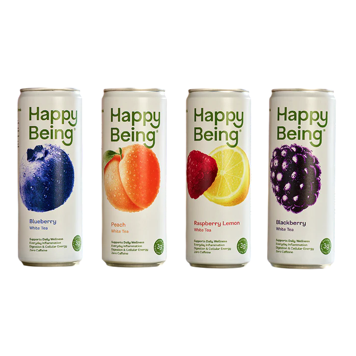 Four cans of \“Happy Being\“ white tea are shown in flavors: Blueberry, Peach, Raspberry Lemon, and Blackberry, each stating \“supports daily wellness\“ with zero caffeine and 3g of some ingredient.