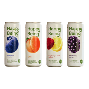 Four cans of \“Happy Being\“ white tea are shown in flavors: Blueberry, Peach, Raspberry Lemon, and Blackberry, each stating \“supports daily wellness\“ with zero caffeine and 3g of some ingredient.