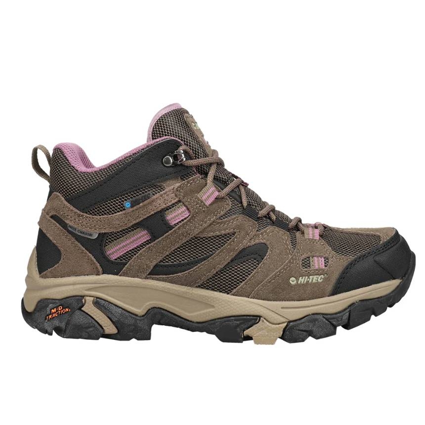 Hi-Tec Apex Hiking Boots feature a rugged design with brown and pink accents, durable mesh and suede construction, a high-traction outsole, and a padded interior for comfort.