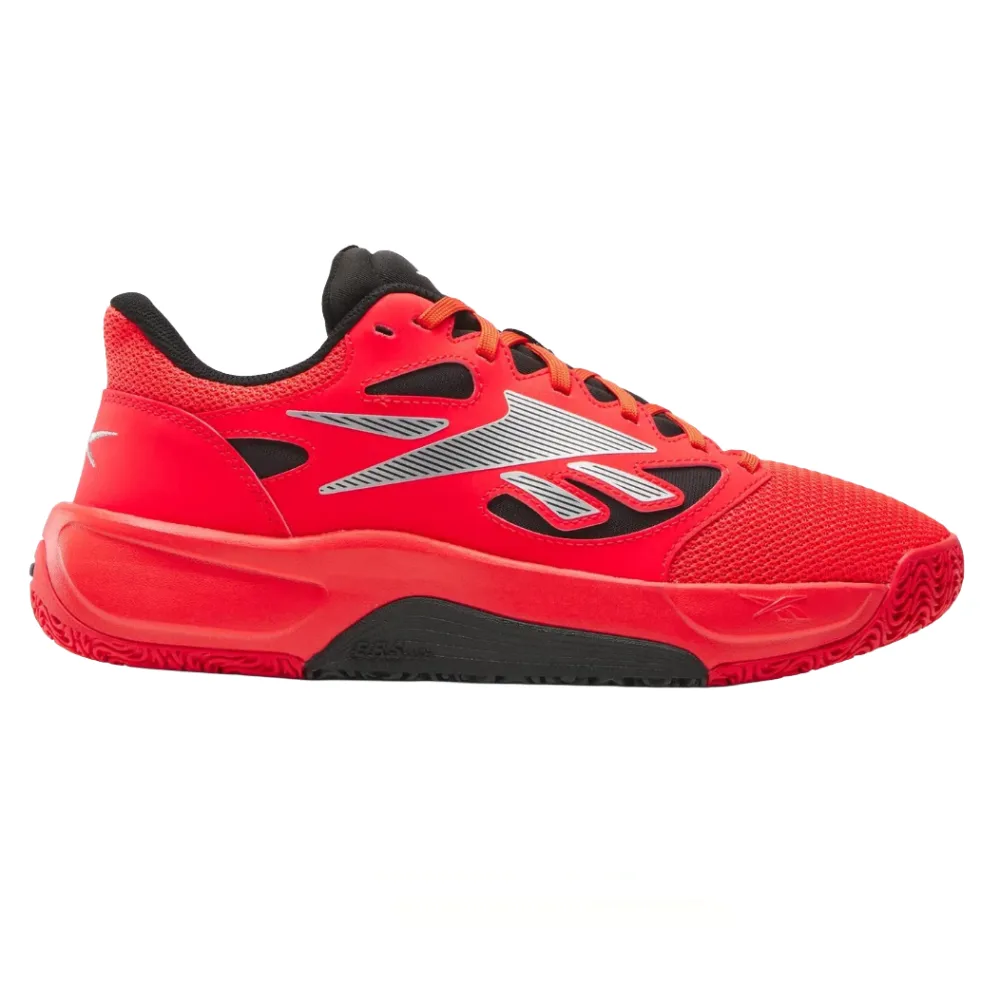 A red athletic shoe with black and silver accents, featuring a mesh upper and a thick sole designed for sports activities.