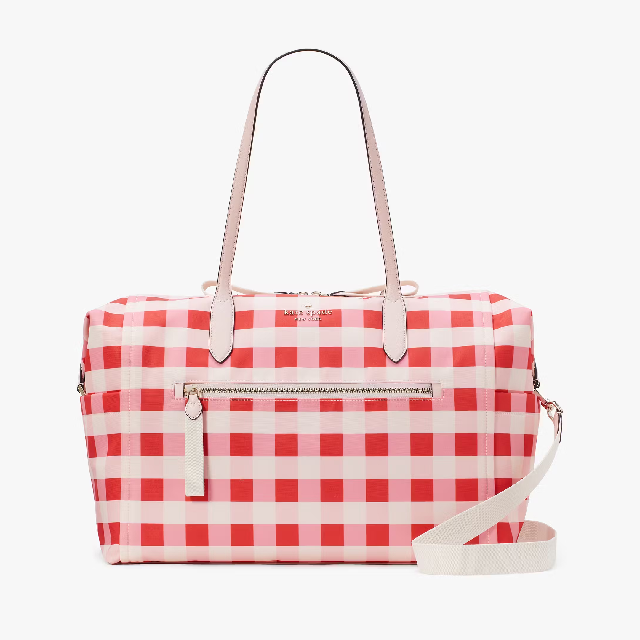 A red and white checkered duffle bag with tan handles and a detachable shoulder strap.
