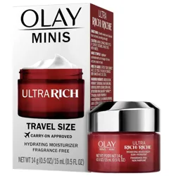 Olay Minis Ultra Rich Hydrating Moisturizer is shown in a travel-size, fragrance-free container. The packaging highlights it's carry-on approved with a net weight of 14g (0.5 oz).